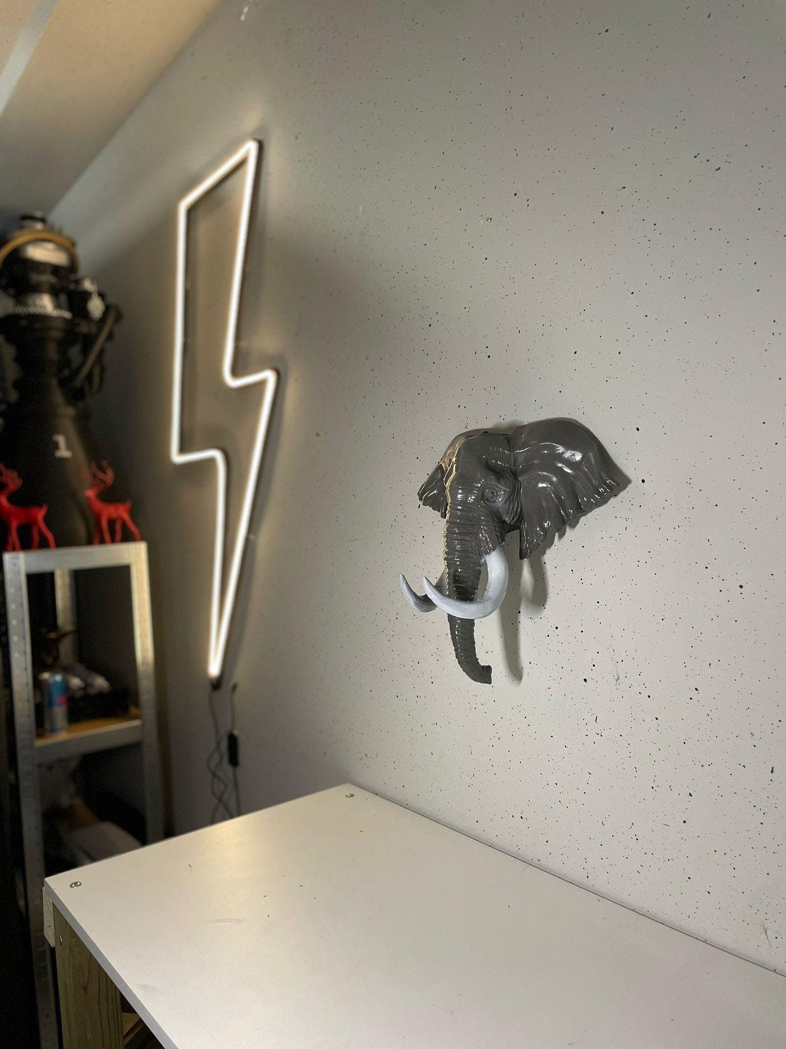 Elephant wall art hanging on a wall