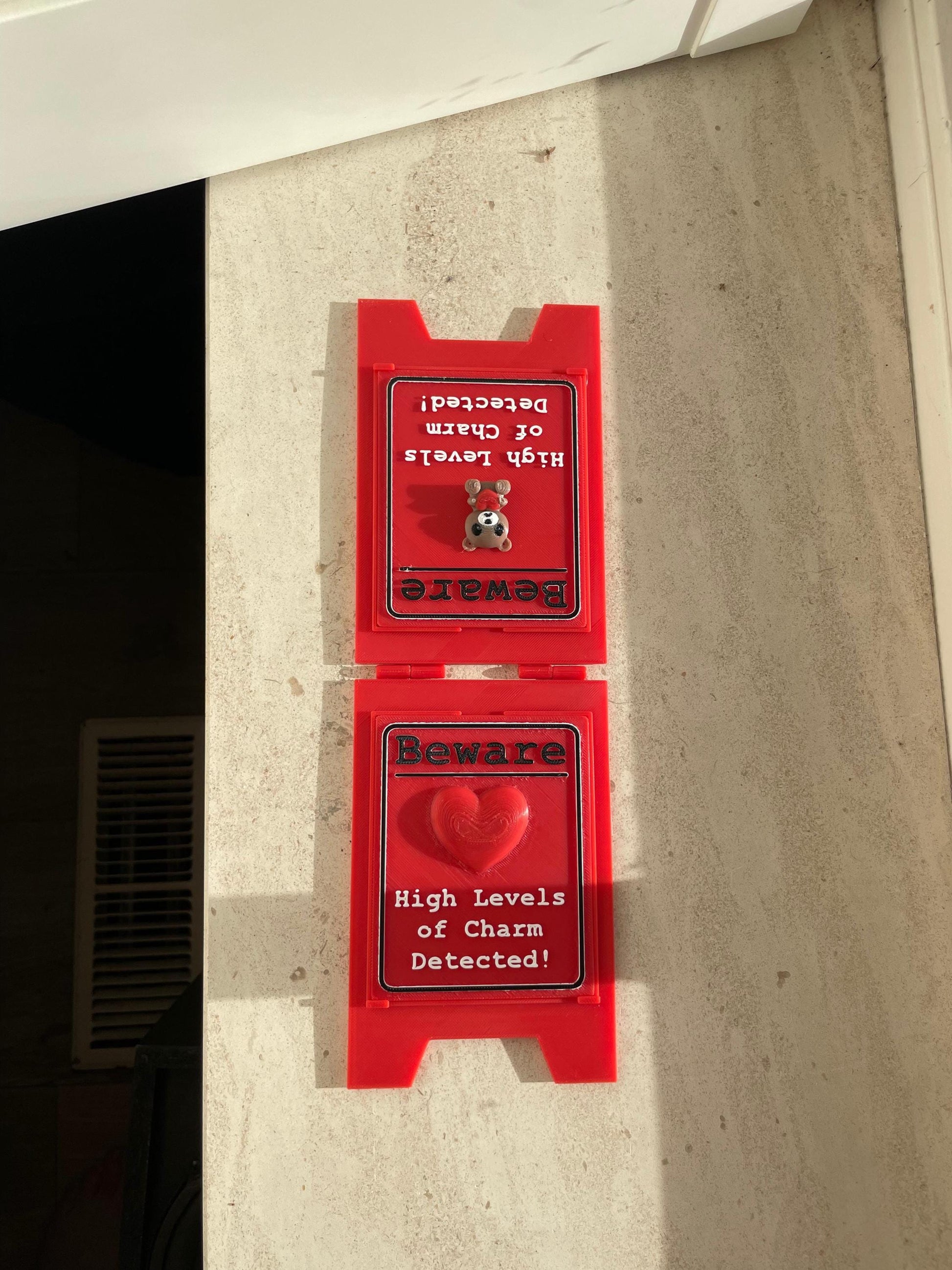 Funny Desk Sign Red A Frame – “Beware High Levels of Charm” Perfect Quirky Gift & Cute Novelty Tabletop Decor!