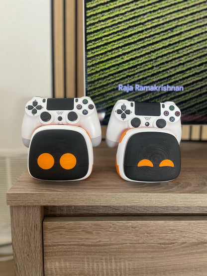 Game Controller Stand x 2 - Cute Robot Design, 3D Printed, Black & Orange Gaming Decor