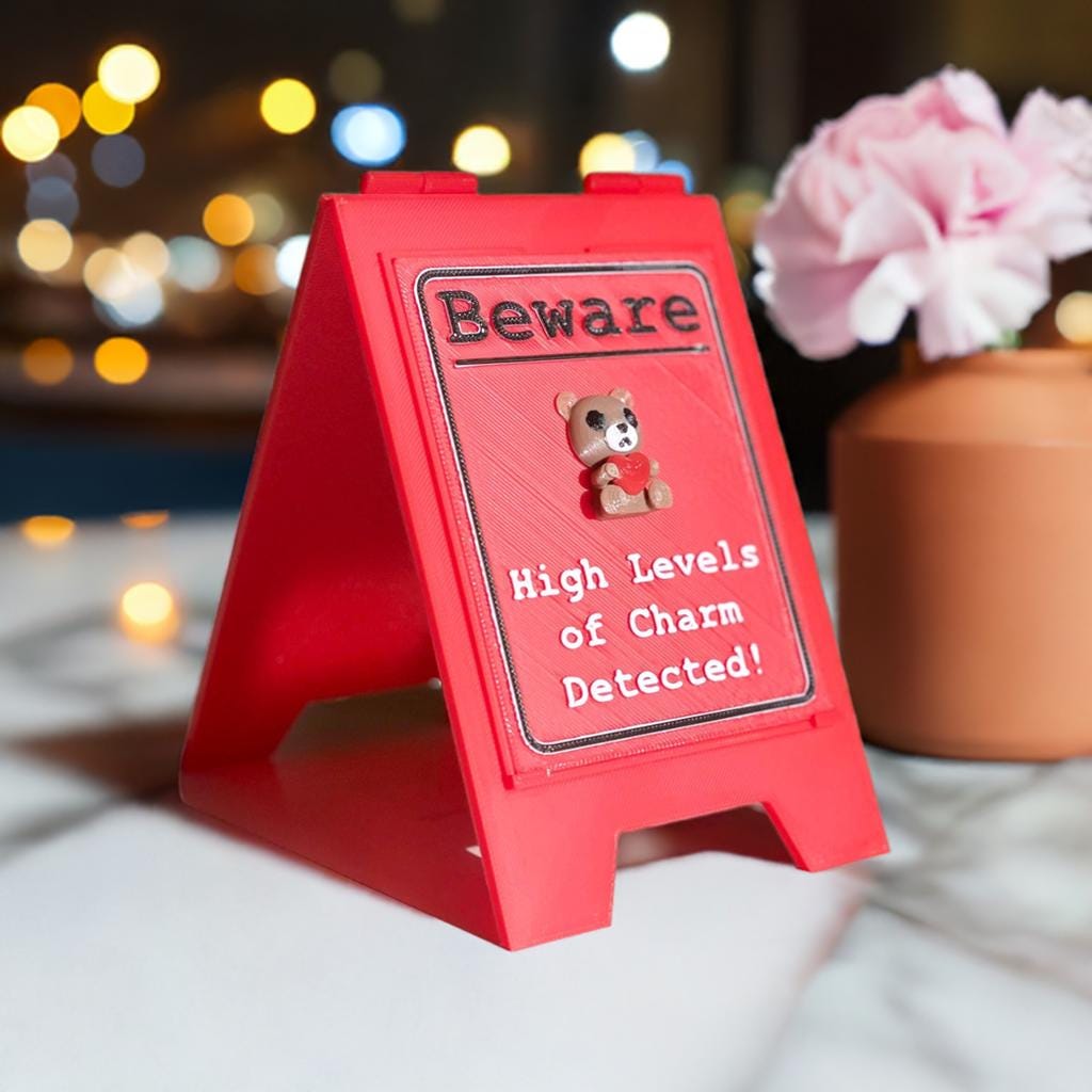 Funny Desk Sign Red A Frame – “Beware High Levels of Charm” Perfect Quirky Gift & Cute Novelty Tabletop Decor!